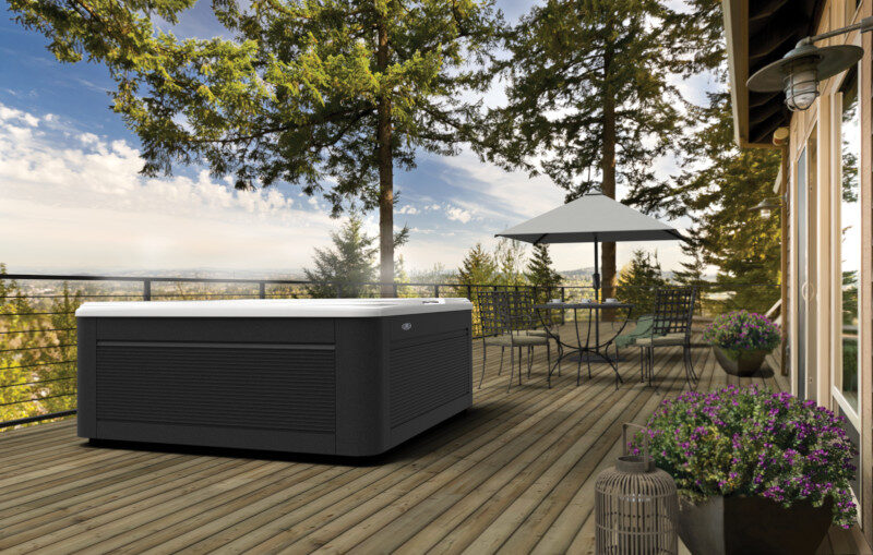 Caldera Vacanza Series spa on a Pacific Northwest deck